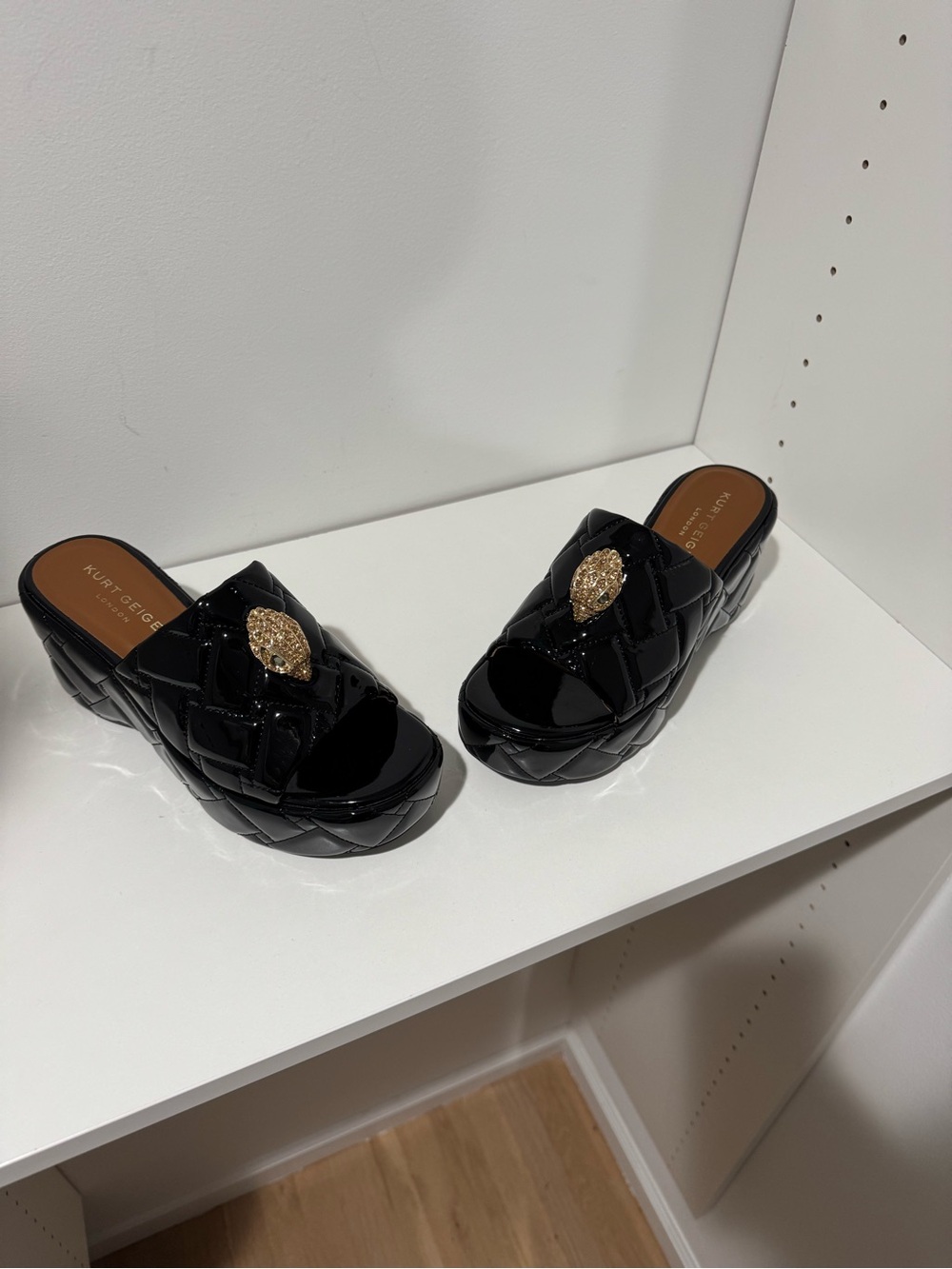 Kurt Geiger Black Quilted Platform Slide Mules with Gold Medallion